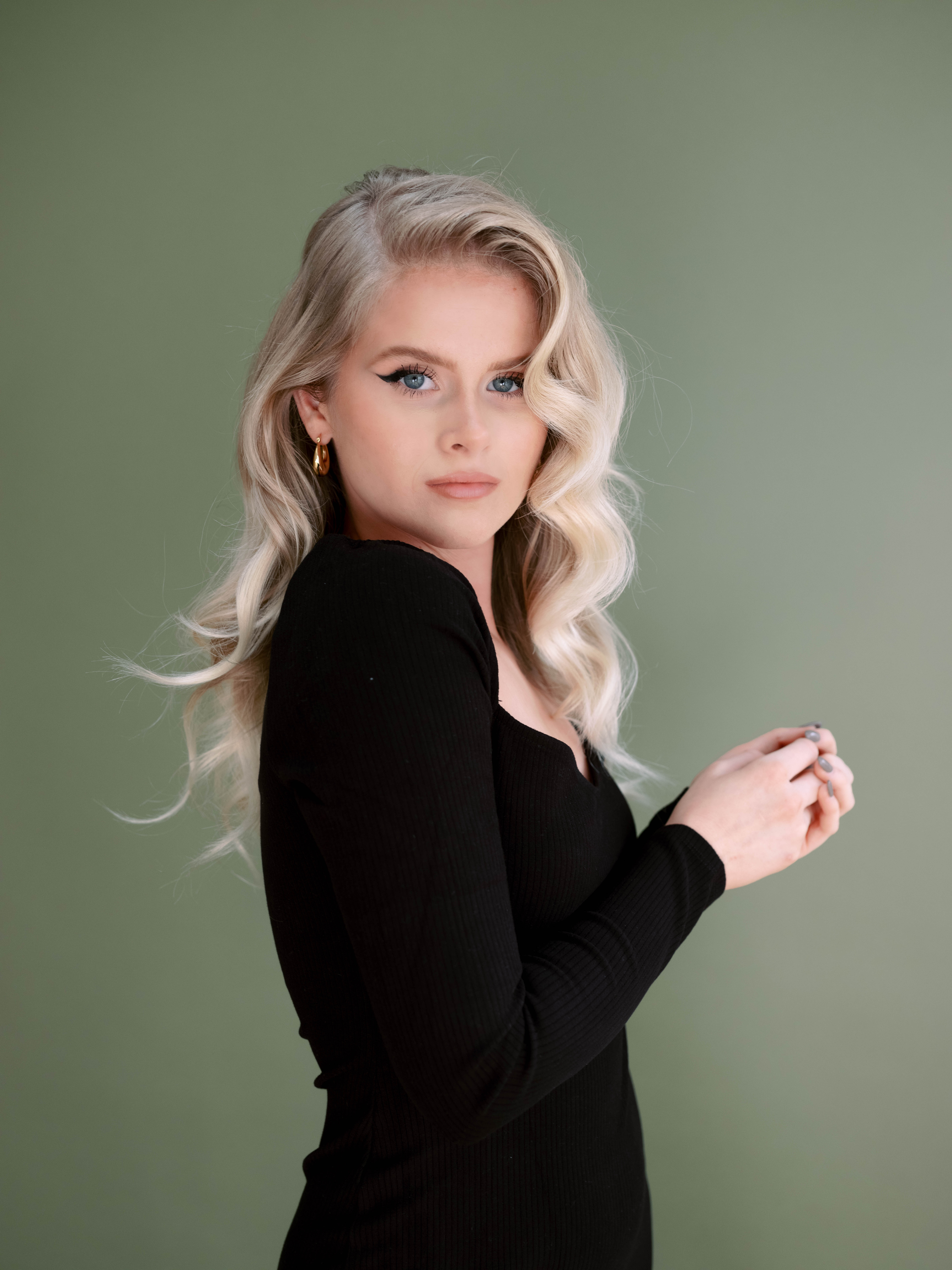 Modern Headshot for Photographer with Green Backdrop