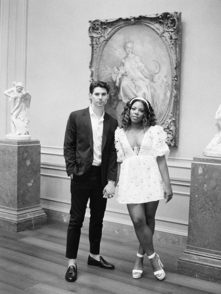 Engagement photos of a couple inside the National Gallery of Art Museum in Washington, DC. 