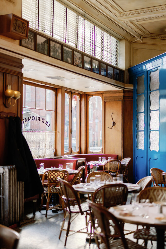 Cafe chairs in a sun filled room at Le Diplomate in Washington, DC