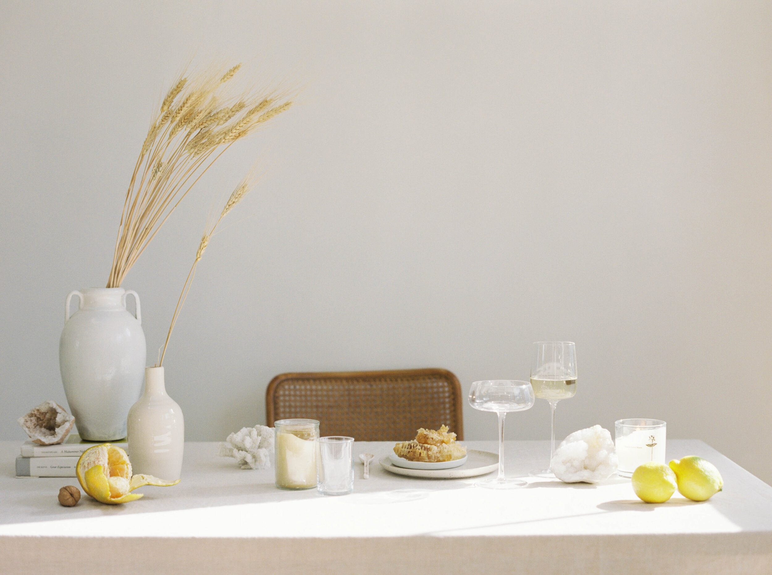 Simple tablescape with wheat and honey