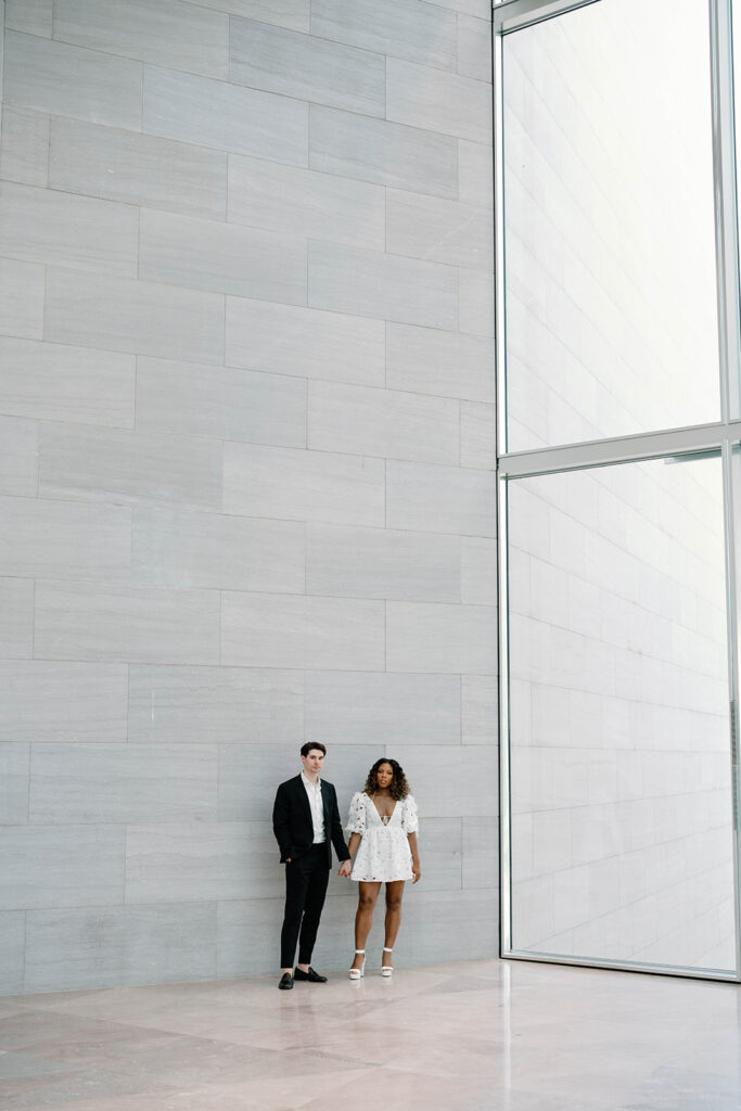 Engagement photos of a couple inside the National Gallery of Art Museum in Washington, DC. 